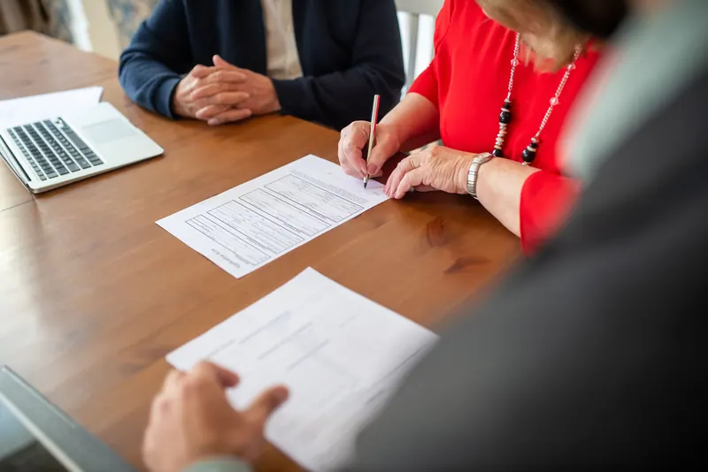 Founders meeting over documents to plan a business
